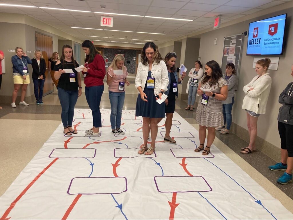 A teacher participates in an unplugged activity