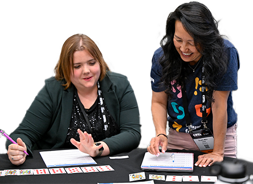 Two women work together on a project